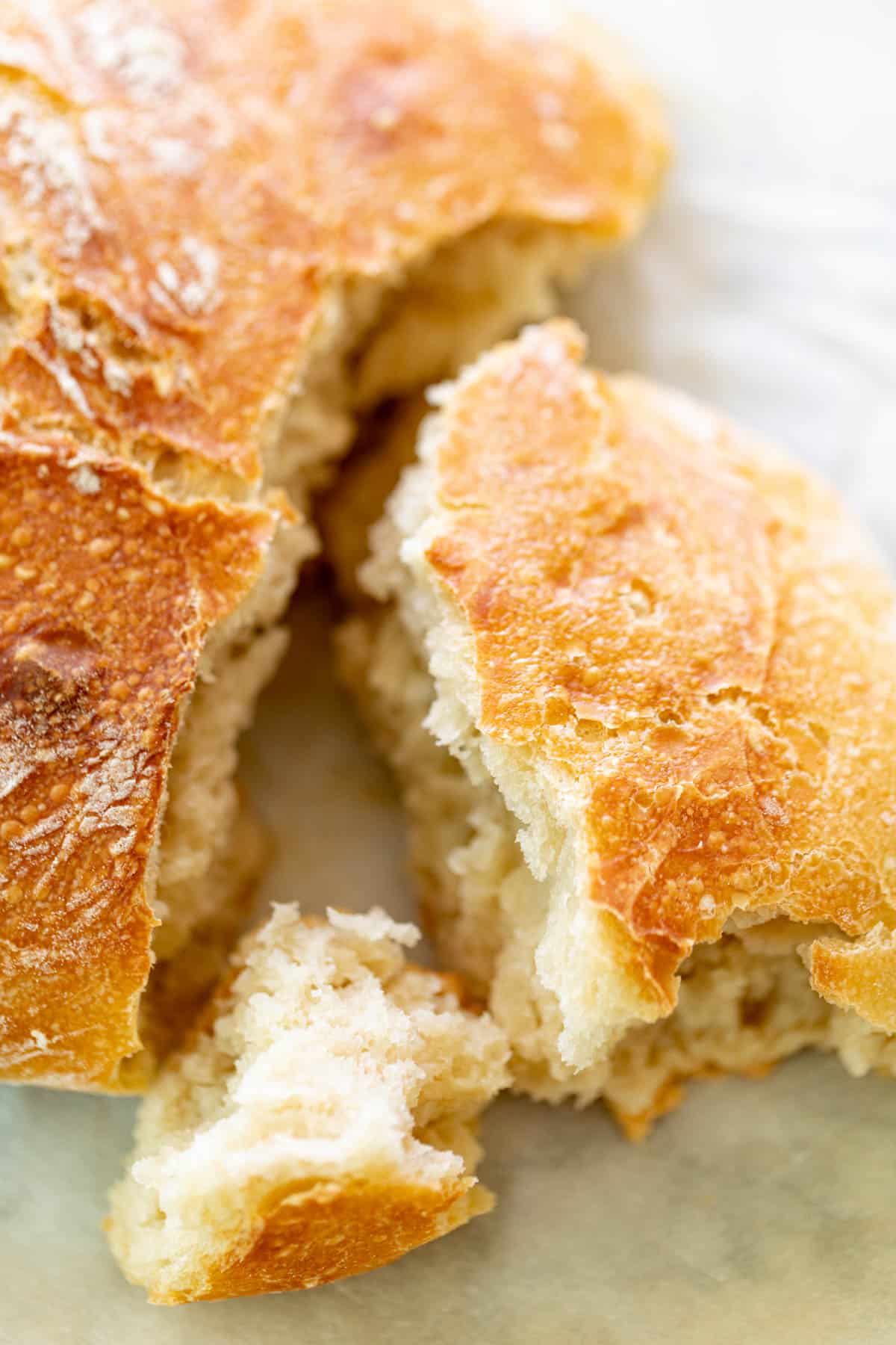 A torn piece of Artisan Bread | cafedelites.com