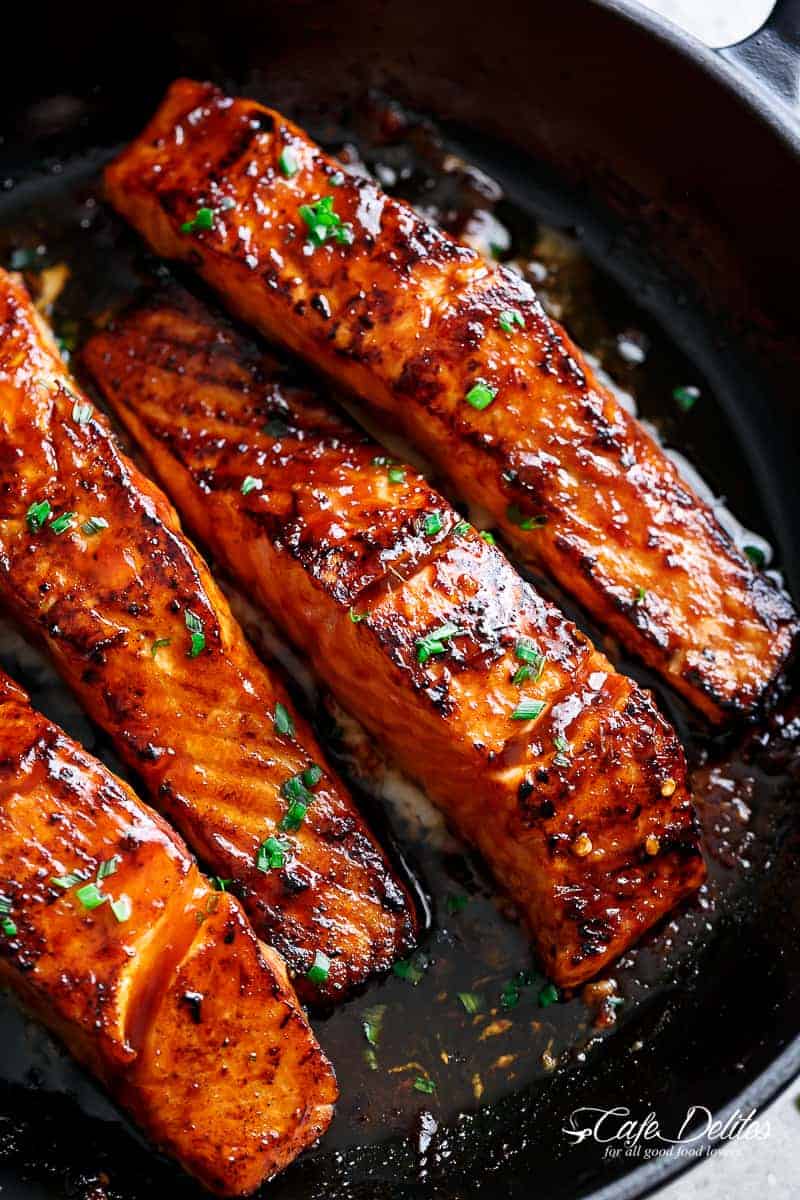 Firecracker Salmon recipe with an incredible sauce is an easy to make dinner in minutes! Flakey and tender on the inside with crispy edges. | cafedelites.com