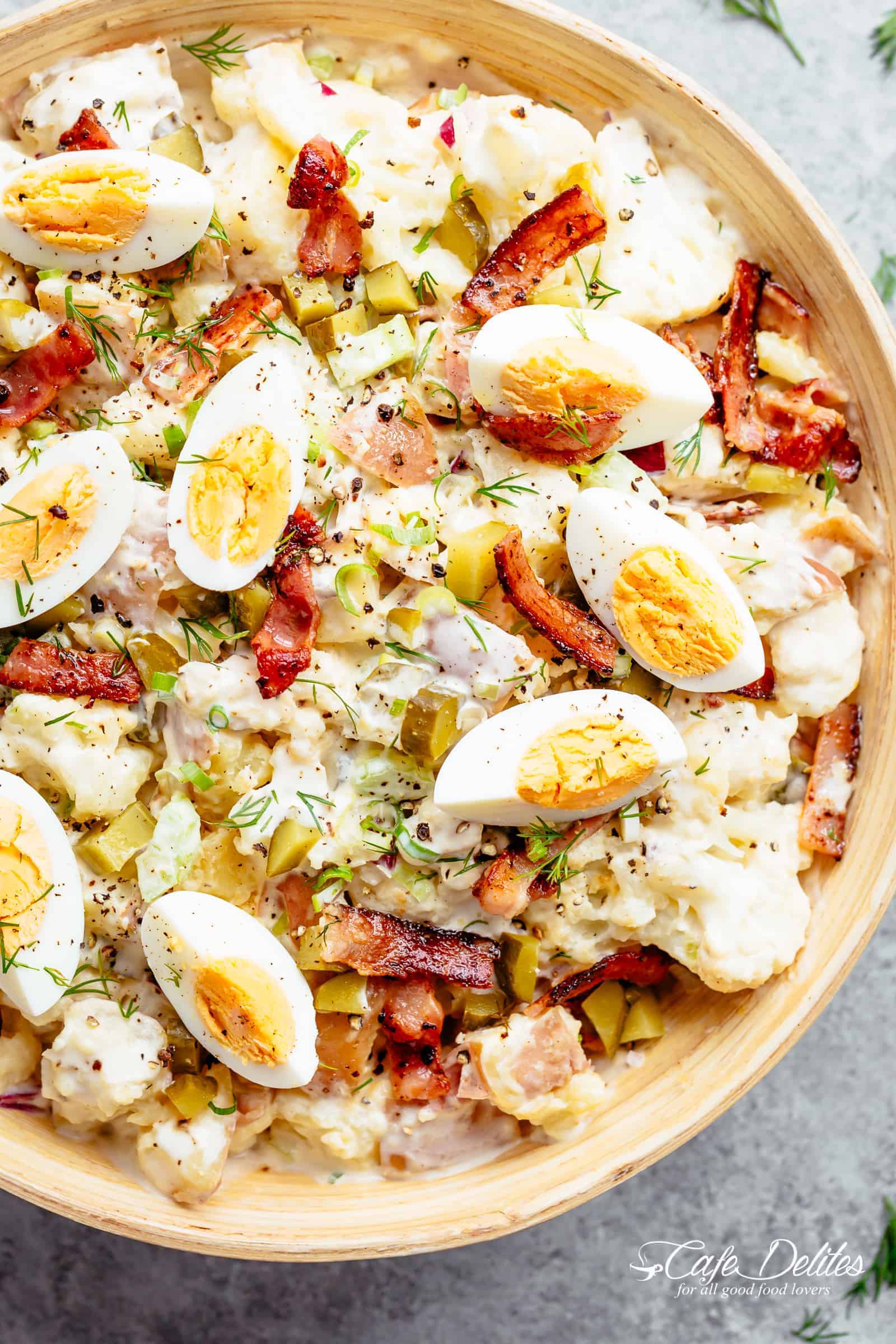 Potato Salad with Bacon, Dill Pickles, Eggs AND a creamy mayo/sour cream dressing! | cafedelites.com