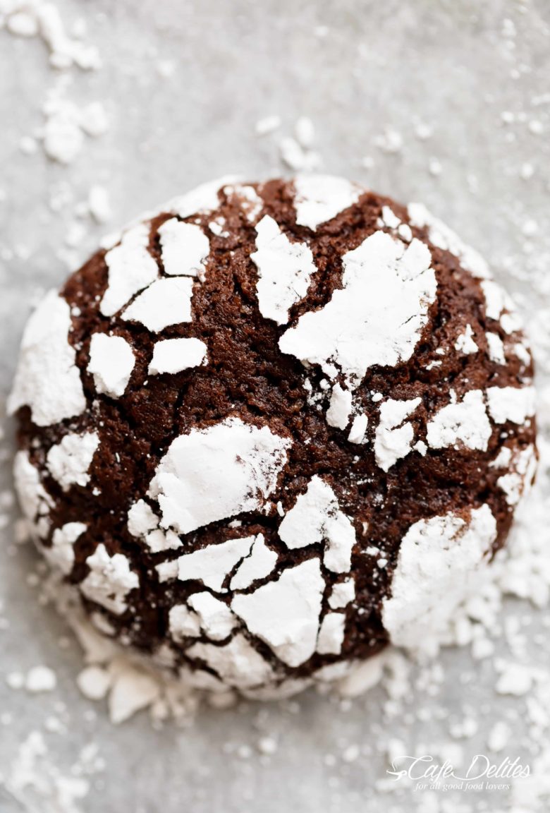 Fudgy Chocolate Crinkle Cookies have an irresistible brownie textured centre, with a crunch of cookie on the outside! One of our favourite Christmas cookies right here! ONLY 88 calories EACH! | https://cafedelites.com