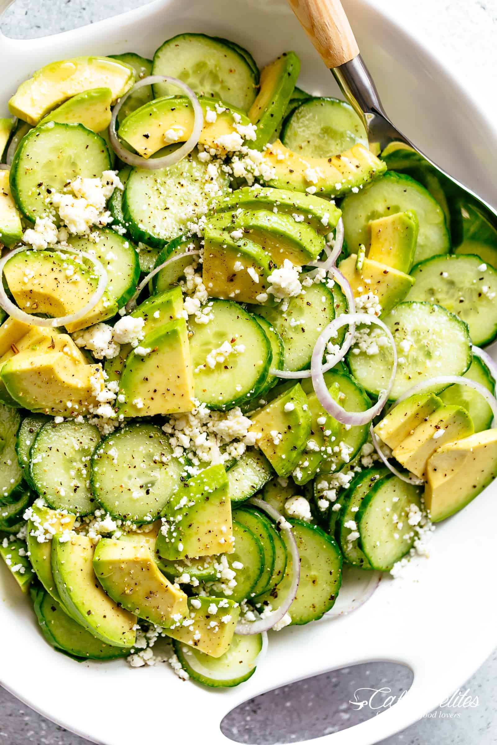 Avocado Feta Cucumber Salad with a delicious Greek inspired salad dressing or vinaigrette! The best side salad for any main meal. | cafedelites.com