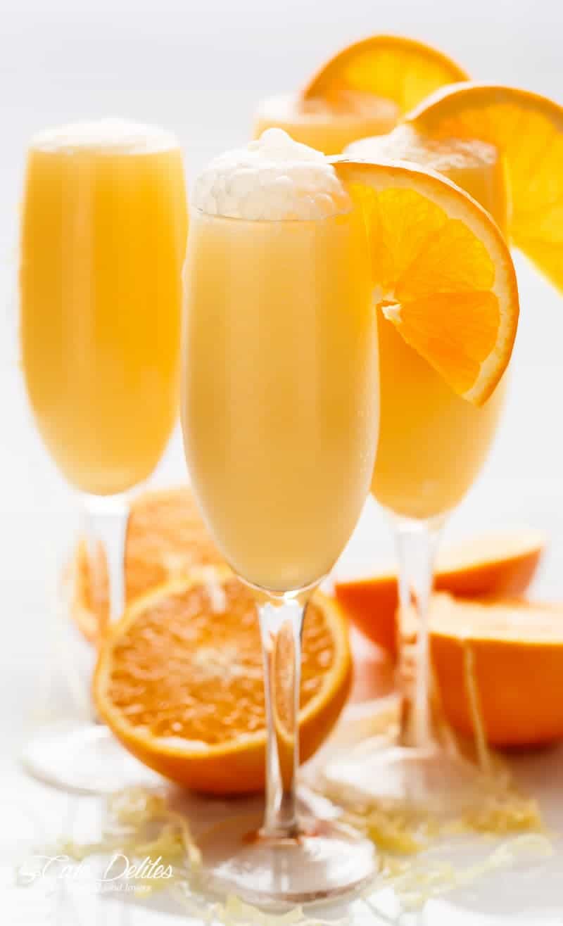 Orange Creamsicle Mimosas is the perfect refreshing beverage to add to your breakfast or brunch menu! A champagne cocktail that tastes just like a Creamsicle! | https://cafedelites.com