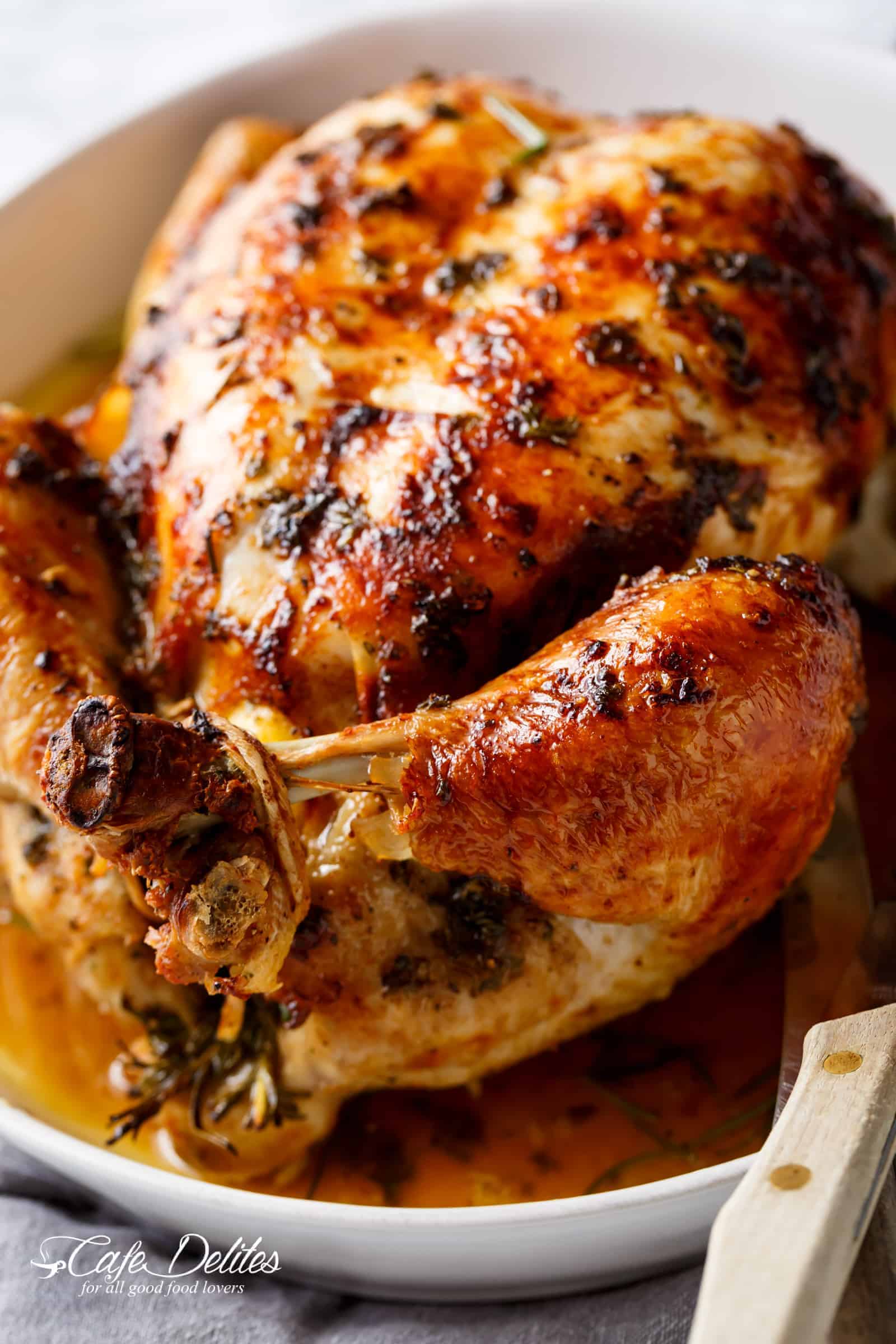 Garlic Herb Butter Roast Chicken packed with unbelievable flavours, crispy skin, and so juicy! | cafedelites.com