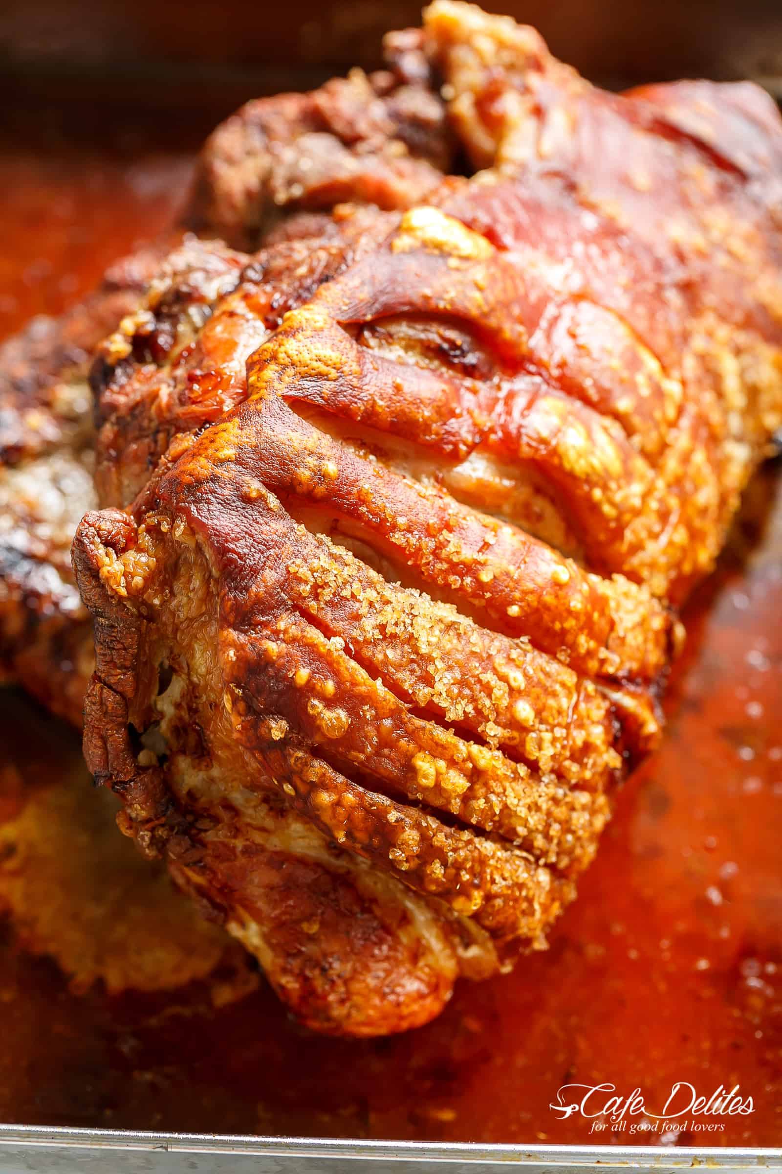 The Most Perfect Pork Roast With Crackling to hit your weekend or holiday table! Roasting a pork shoulder or butt is so easy, but to get the crackle makes it all the more worth every minute waiting! | cafedelites.com