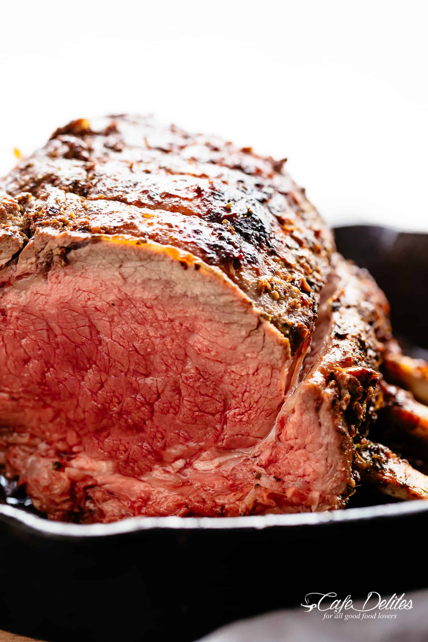 Prime Rib Roast full of flavour garlic butter and herbs! | https://cafedelites.com
