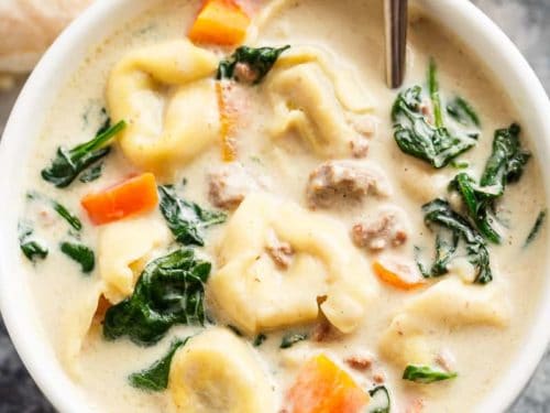 Slow Cooker Creamy Tortellini Soup is pure comfort food, loaded with vegetables, Italian sausage and cheese tortellini! NO flour and NO heavy cream! | https://cafedelites.com